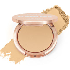 A rose gold compact of Flawless Matte Pressed Powder with powder scattered around it.