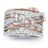 Wide crossover ring with silver, rose gold, and rhinestones.