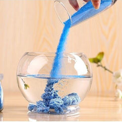 Jarreims Emporium: Blue hydrophobic sand poured into water bowl.