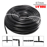 Rolled coil of black 1/4′′ drip irrigation hose tubing.