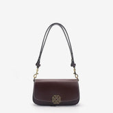 Jarreims Emporium: Brown leather shoulder bag with gold logo.