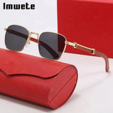 Gold-framed square sunglasses with brown wood-look arms on a red case.