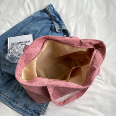 Große Kapazität Damen Umhängetasche 2023 Neue modische frische und einfache gestreifte Samthandtasche Kunst Freizeit Student Einkaufstasche