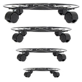Black metal round plant caddies with wheels, multiple sizes.