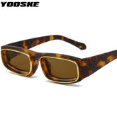 Rectangle tortoiseshell sunglasses with gold inner-rims and brown lenses.