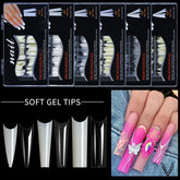 Soft gel nail tips in 5 boxes, 5 shapes, and pink manicured nails.