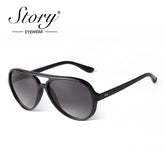 A single pair of black aviator-style sunglasses with dark gradient lenses and a plastic frame.