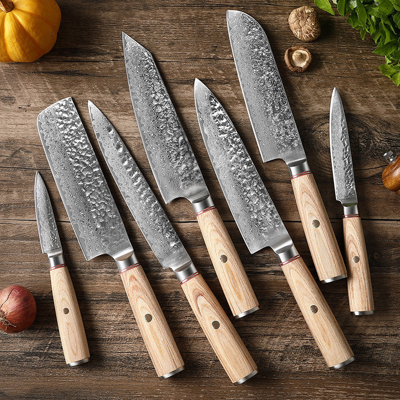 Seven-piece Damascus-style stainless steel kitchen knife set.