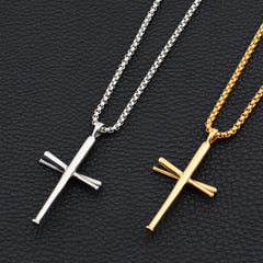 Silver and gold baseball bat cross necklaces on box chains.