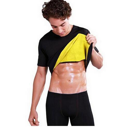 Sweaty man lifting up a black and yellow sauna shirt.
