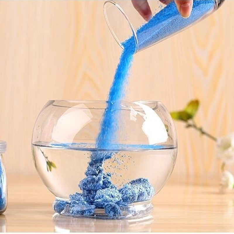 Jarreims Emporium: Blue hydrophobic sand poured into water bowl.
