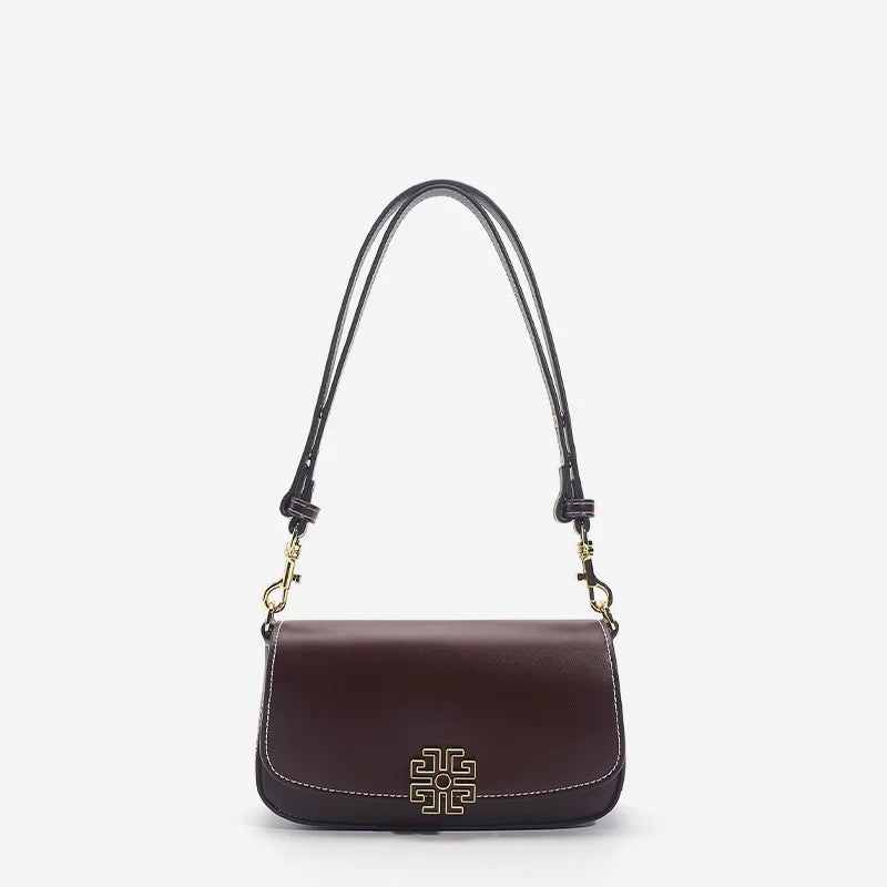 Jarreims Emporium: Brown leather shoulder bag with gold logo.