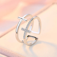 Silver-tone, double-band ring with a plain and a diamond cross.